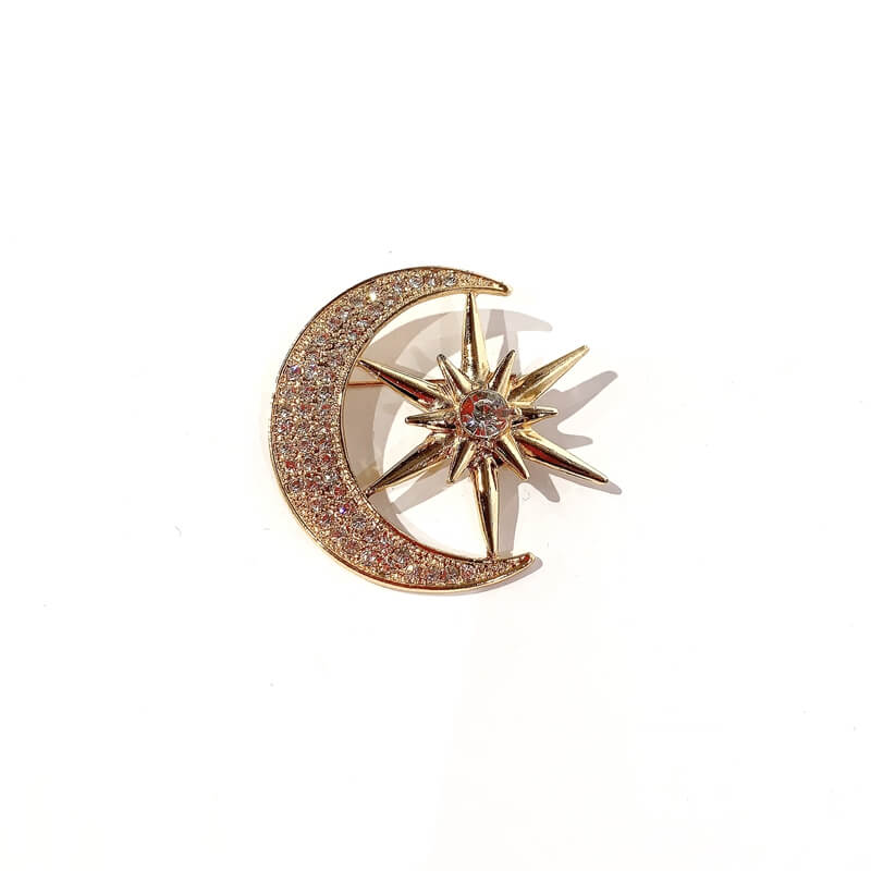 Broche cristal forma luna estrella