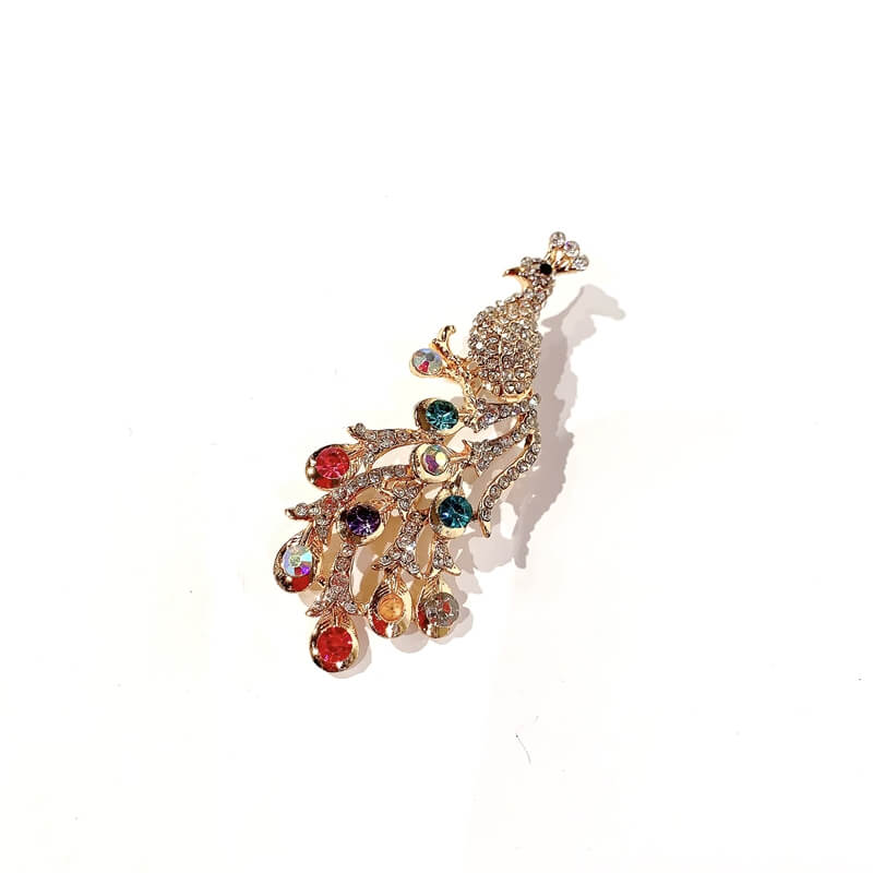 Broche cristal forma pavoreal